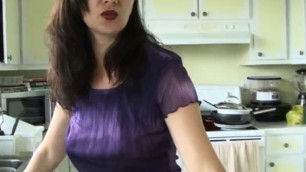 Sexy MILF makes herself some Coffee while Smoking